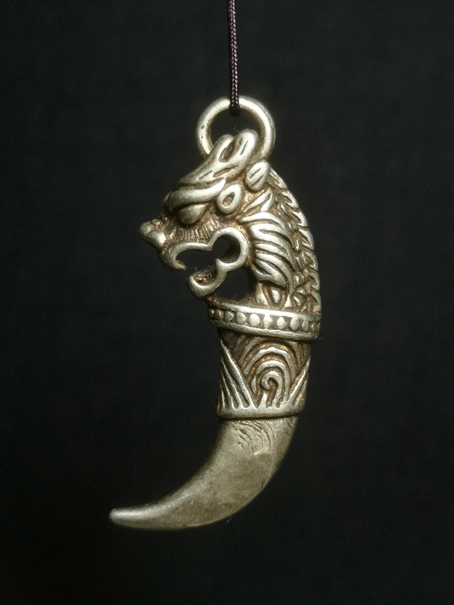 

Old China Tibet Silver Carving Dragon head teeth statue necklace pendant Gift