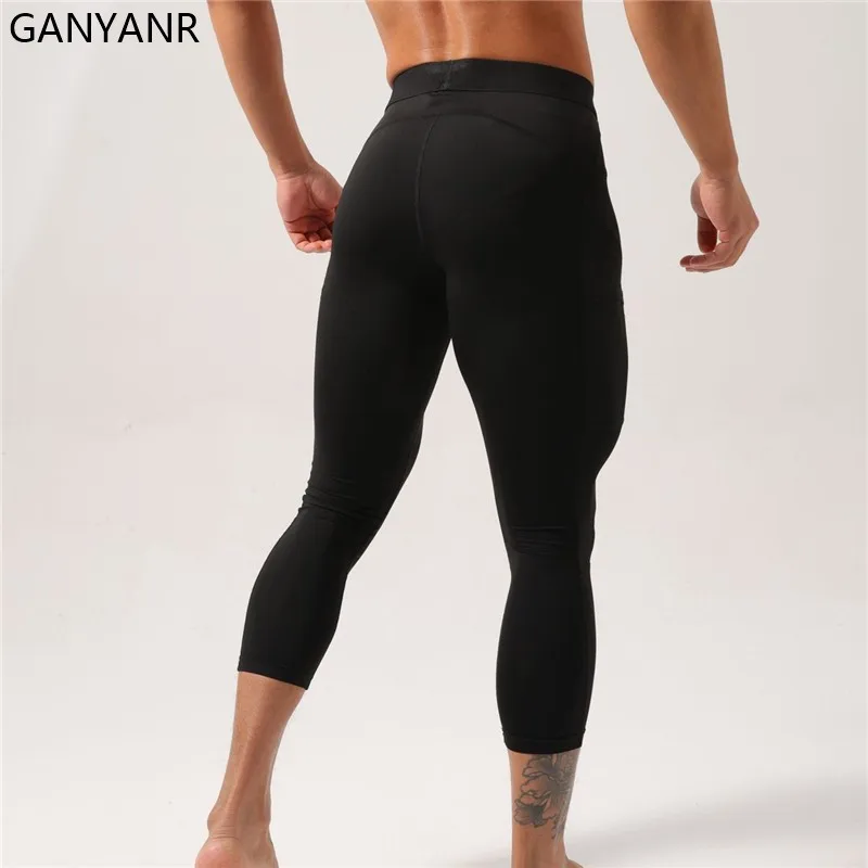 GANYANR Running Tights Men With Pockets Compression Leggings Gym Fitness Football basketball Soccer Sportswear Pants trousers