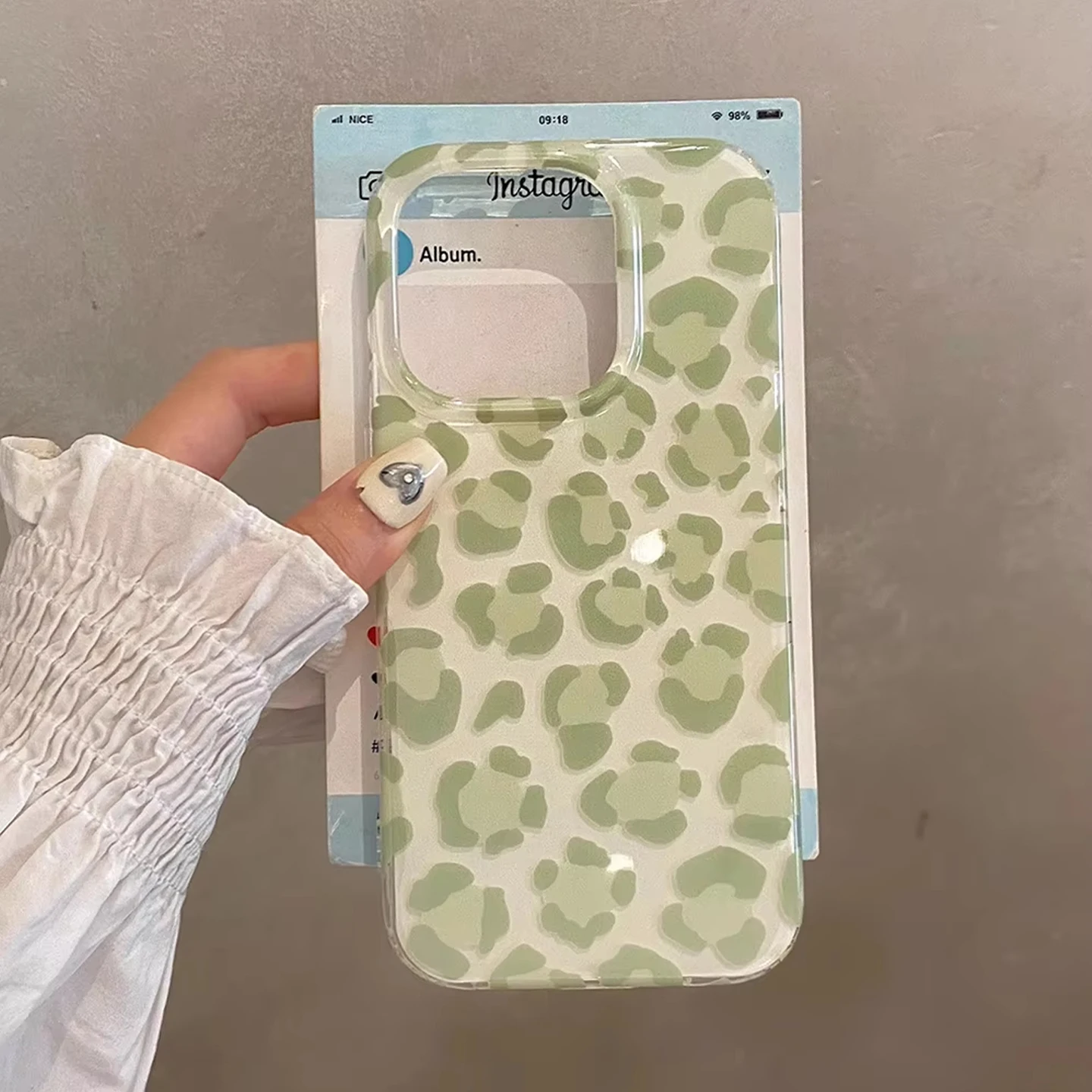 Chic Leopard Print Phone Case with Green-Pink Design and Leather Texture