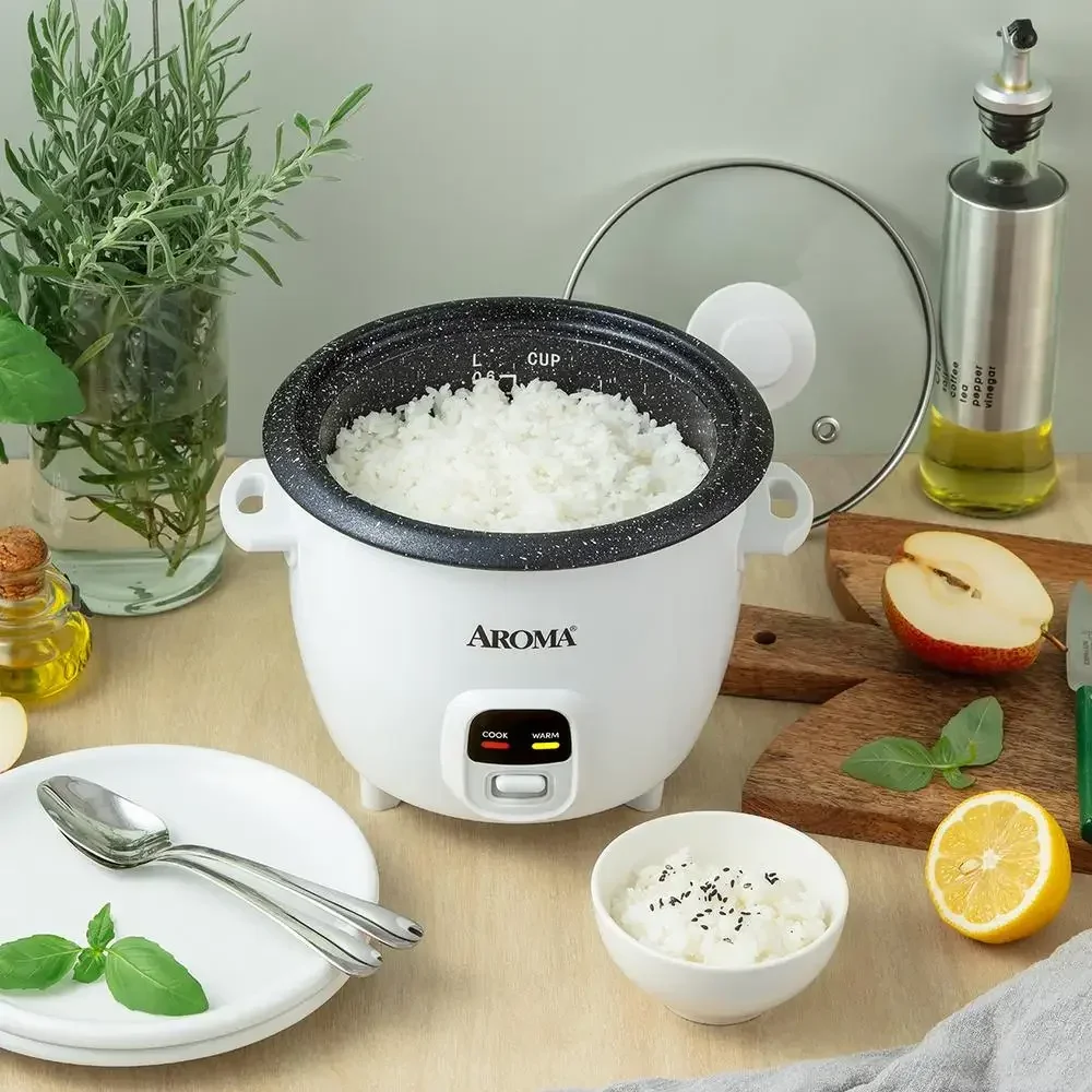 6-Cup Rice & Grain Cooker Bonded Granite® Pot One-Touch Design Keep-Warm Mode Accessories Included Easy to Clean Premium Glass 3