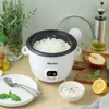 6-Cup Rice & Grain Cooker Bonded Granite® Pot One-Touch Design Keep-Warm Mode Accessories Included Easy to Clean Premium Glass 3