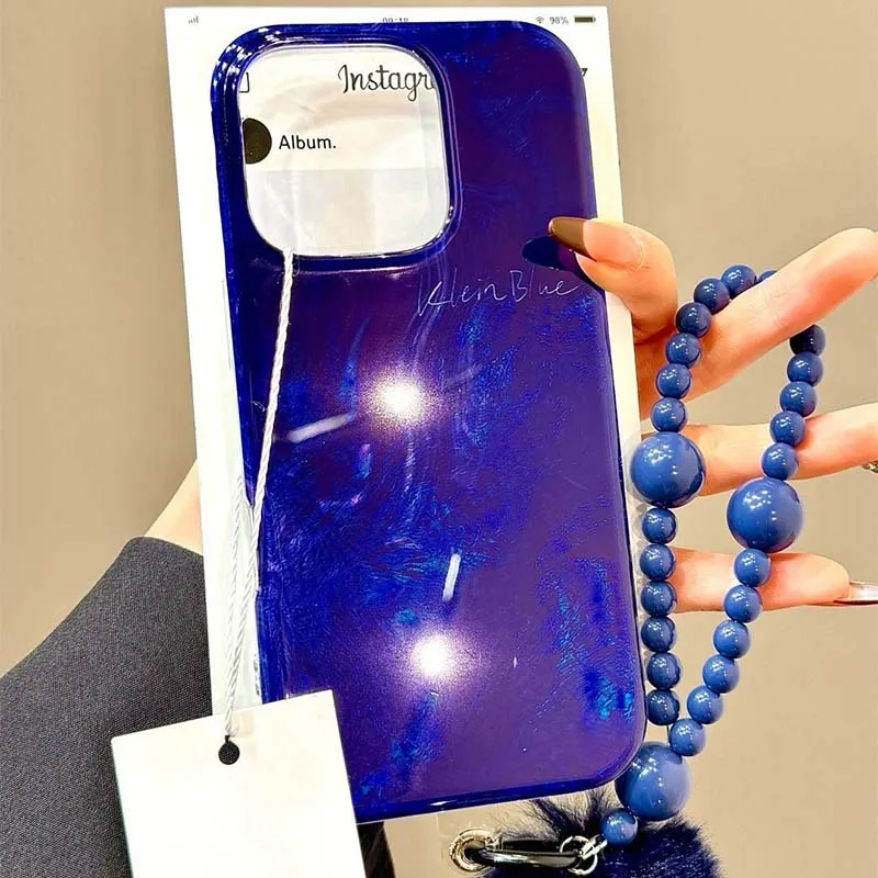 Whirlpool Pattern Blue Embossed Phone Case with Plush Ball Charm