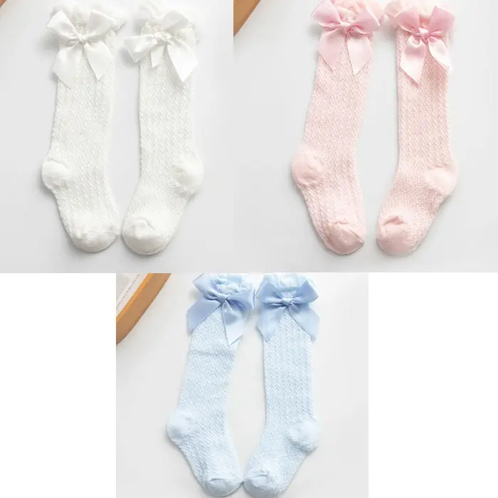 Three pairs of a white Pink Blue