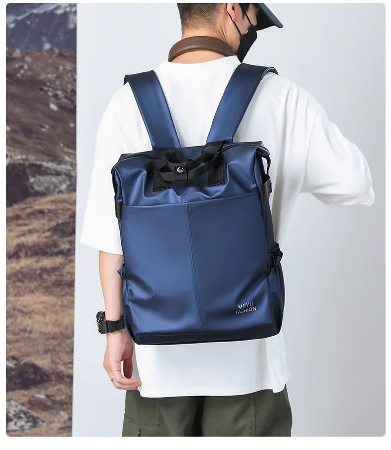 ผู้ชาย PU ฟิล์มกระเป๋าเป้สะพายหลังธุรกิจท่องเที่ยวแบบพกพาเดินทางไปทํางานกระเป๋าเป้สะพายหลัง High-end กันน้ําคอมพิวเตอร์กระเป๋านักเรียน