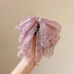 Elegant Floral Bow Pink Hair Clips with Crystal Chain Accents (Pink)