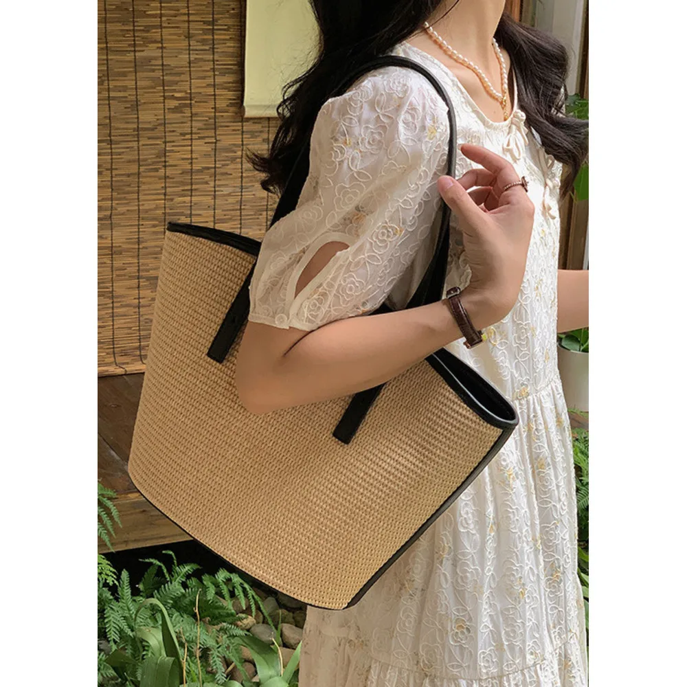 Large capacity underarm tote 2024 new fashionable grass leather woven niche single shoulder women's large bag_voghion.com