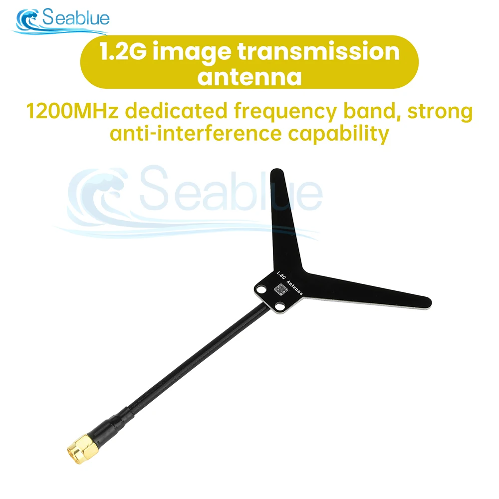 Antenne FPV 1.2G 2dBi SMA posée sur une table, montrant sa forme droite et sa base filetée.