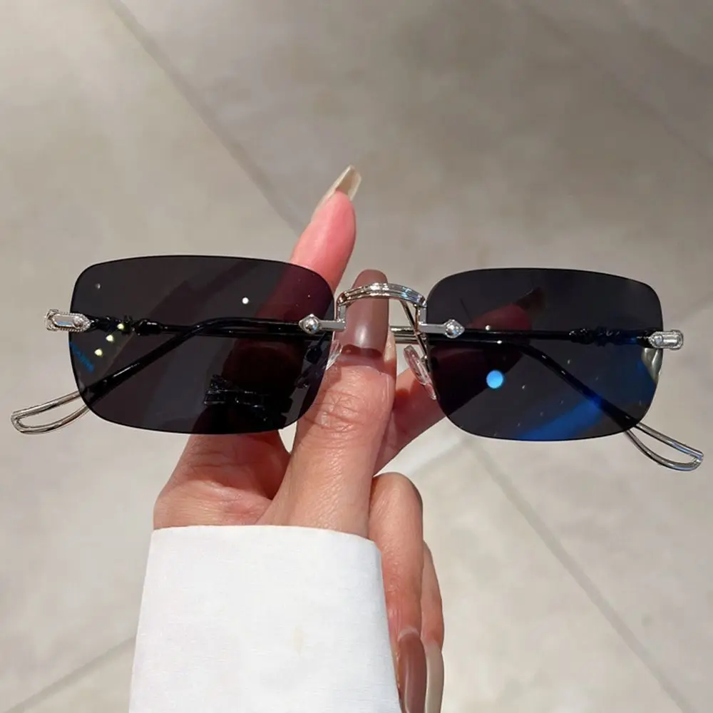 Sleek Unisex Rimless Metal Sunglasses with UV400 Ocean Lenses
