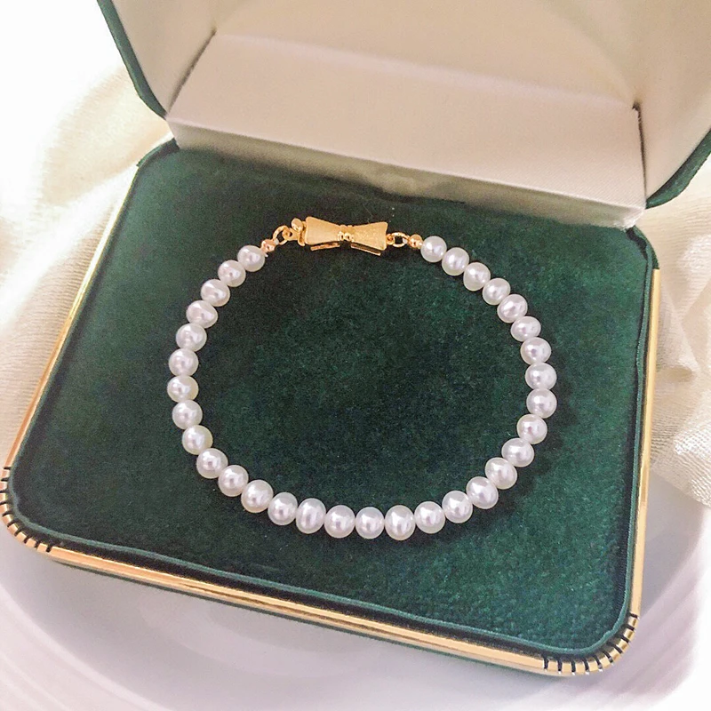 

Dainty jewelry 5-5.5mm bow tie gold plated jewelry pearls beads bracelets