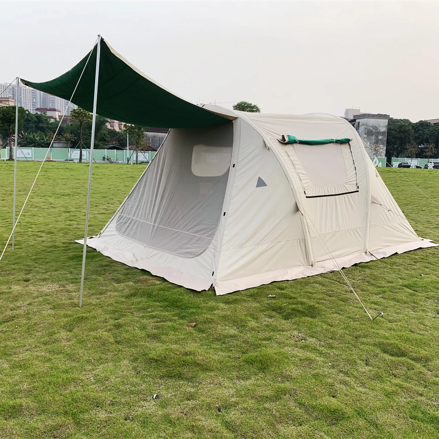 

2023 New Outdoor Camping Activity Big Canvas Waterproof Airtight Outdoor Inflatable Tent