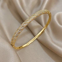 Bracelets de luxe torsadés en Micro incrusté de Zircon pour femmes, à la mode, en cuivre plaqué or, empilés, bijoux cadeaux 6