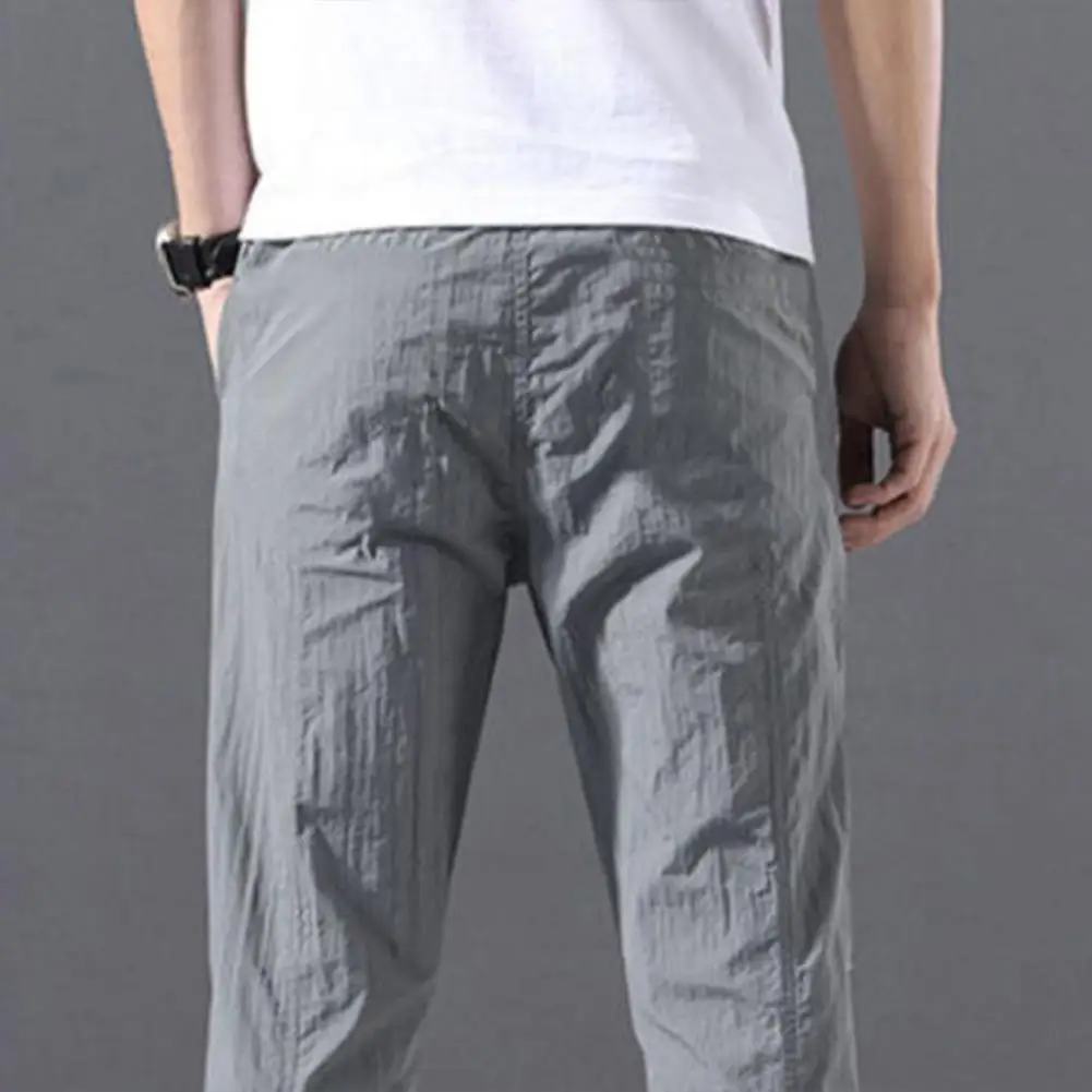 Description Picture 6 of itemMen Trousers Non-pilling Mid-waisted Polyester Summer Lace-up Pockets Men Sweatpants Drawstring Pants Daily Wear