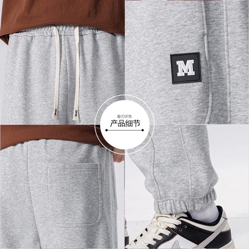 Spring Autumn New Solid Color Fashion Elastic Waist Sweatpants Man High Street Casual Loose Pockets Drawstring Cotton Trousers