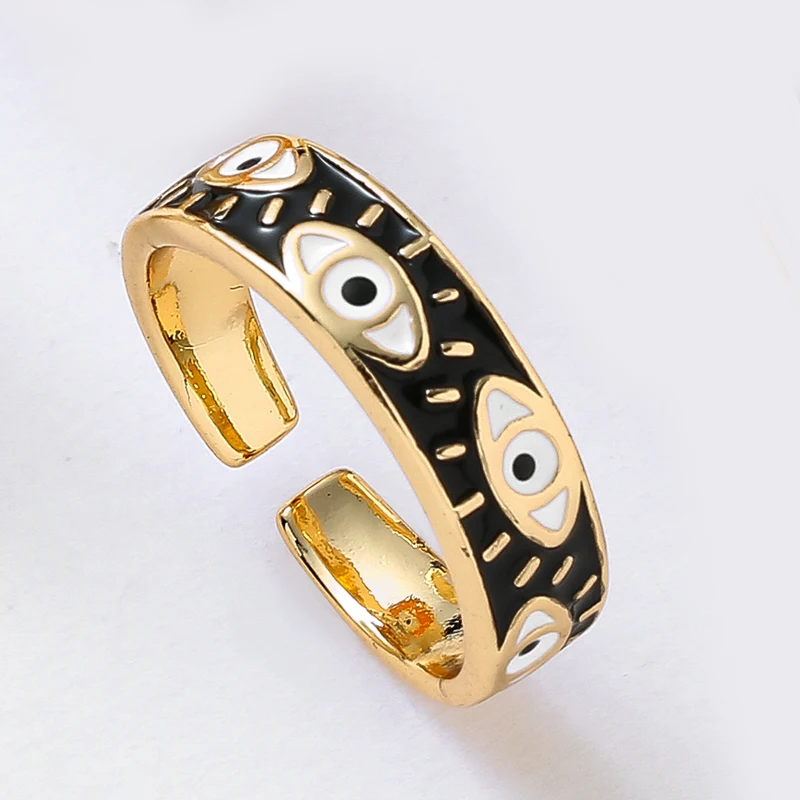 Anel dourado e preto