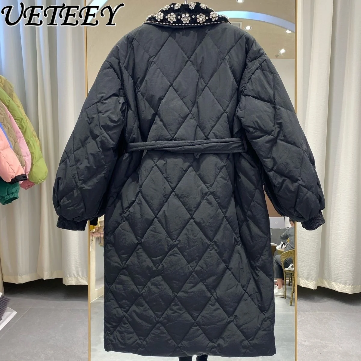 Рисунок 6 - Женский пуховик средней длины