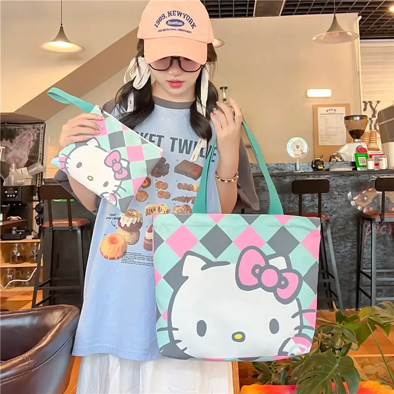 

Sanrio Kawaii Hello Kitty Canvas Bag Carrying Bag for Going Out Fashion Sweet Girls Lightweight and Large Capacity Shoulder Bag