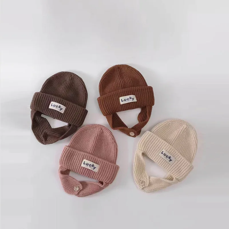 Рисунок 6 - Осенне-зимние детские шапки вязаные