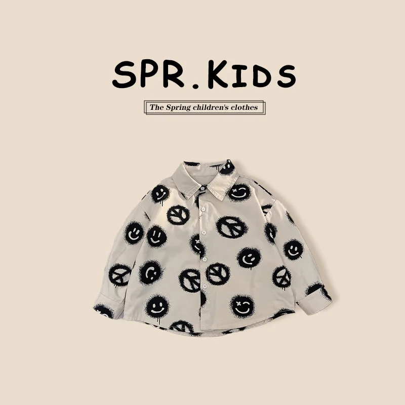 

Корейские весенние детские футболки для мальчиков, хлопковые топы с отложным воротником для маленьких мальчиков, свободные универсальные рубашки для маленьких мальчиков с принтом улыбки