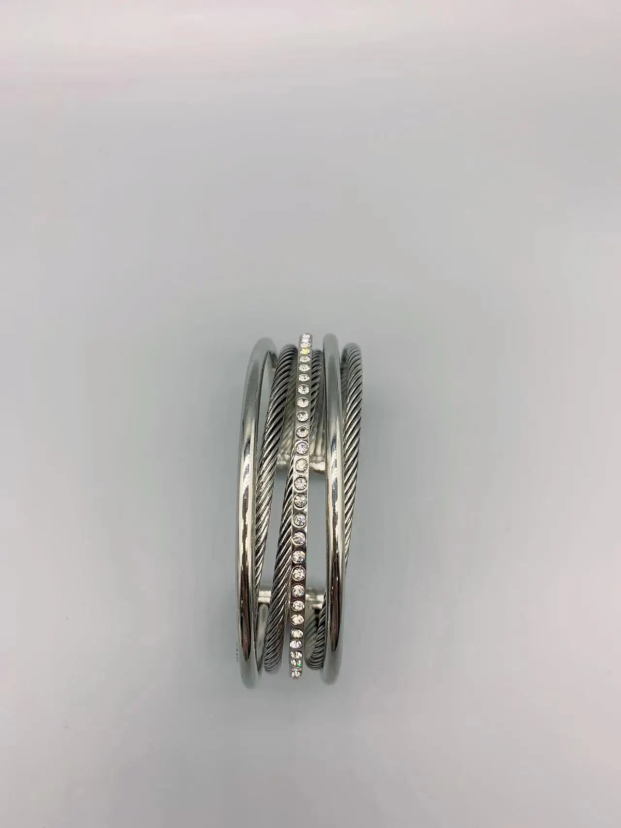 Le Han Jewelry Silver Crossover Four  Row Cuff Bracelet With Clear Cubic Zirconia 23 MM