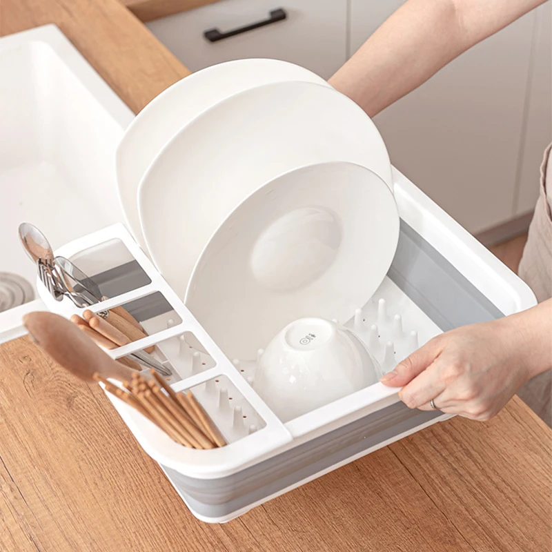 https://ae01.alicdn.com/kf/S0ea21d2b470843ea88e789e2d16a4a65o/Kitchen-Foldable-Drain-Tray-Bowl-Plate-Water-Leakage-Rack-Plastic-Tableware-Drainer-Dish-Drying-Racks-Home.jpg