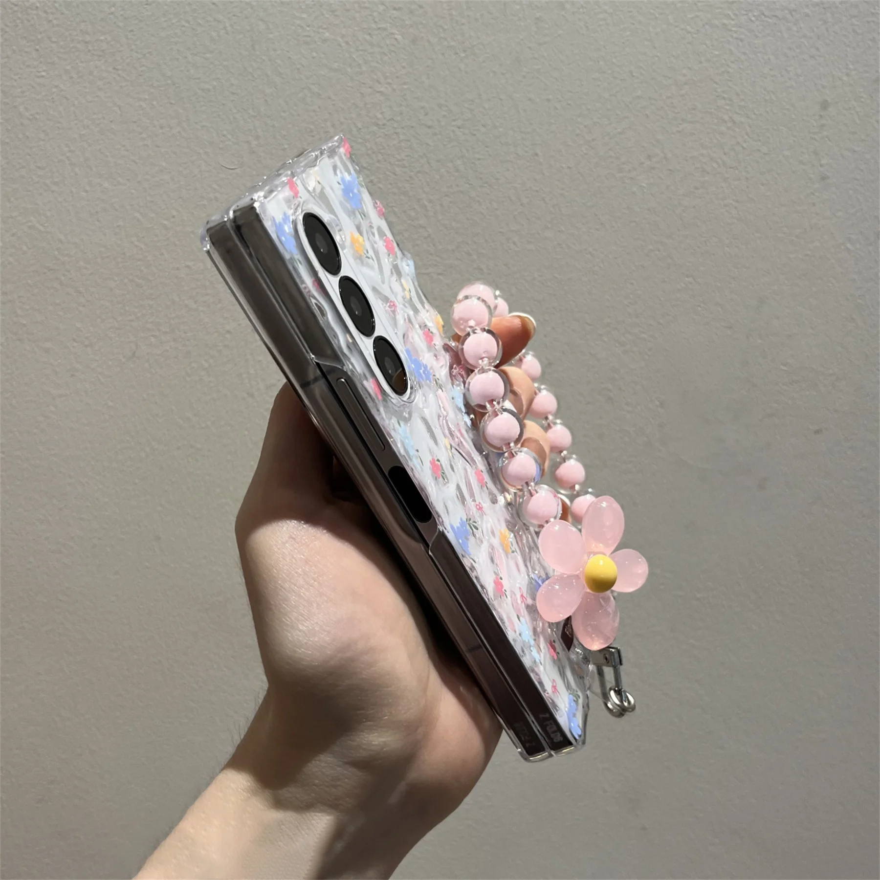 Cute Blue Floral Transparent Phone Case with Flower Chain Accents