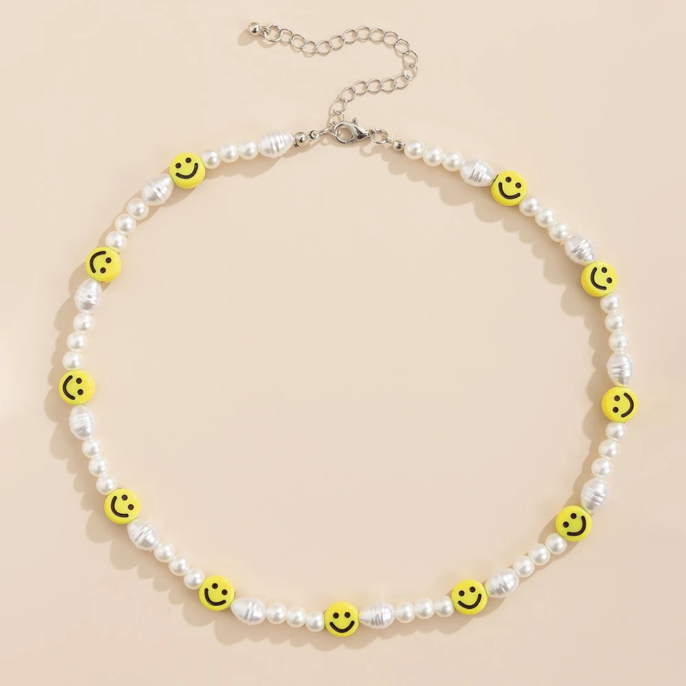 Set di gioielli con volto sorridente di perle - Vista completa
