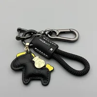 Porte-clés de voiture en cuir véritable, minimaliste, avec sangle Premium, Durable, pour hommes et femmes, cadeau de Couple, 1 pièce 2
