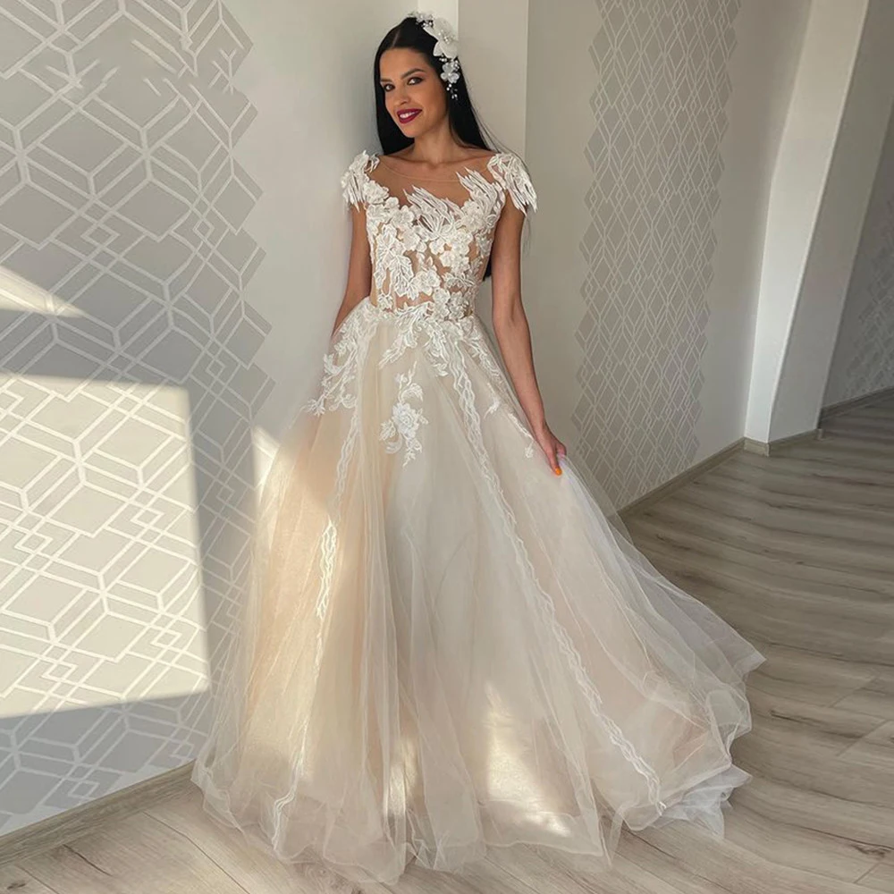 

Illusion Appliques Cap Sleeves Tulle Wedding Dresses 2022 Sheer Neck Pearls Princess Beach A-Line Bride Dress vestido de noiva