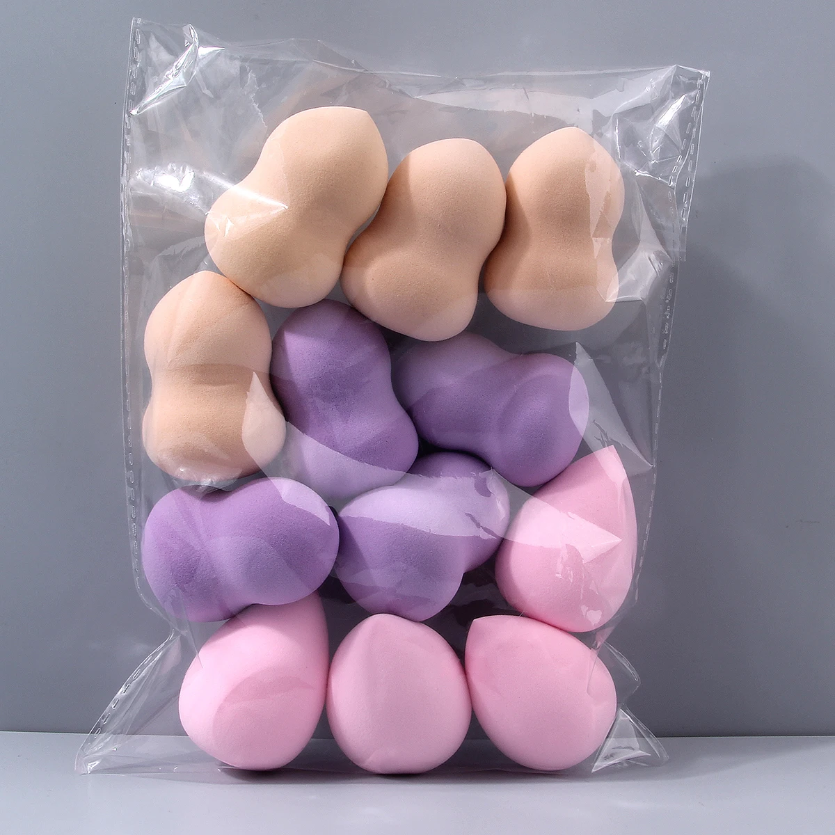 12 adet/paket orta boy güzellik Blender, mükemmel sıvı, krem ve toz uygulaması için çok renkli makyaj süngeri, lateks olmayan ıslak