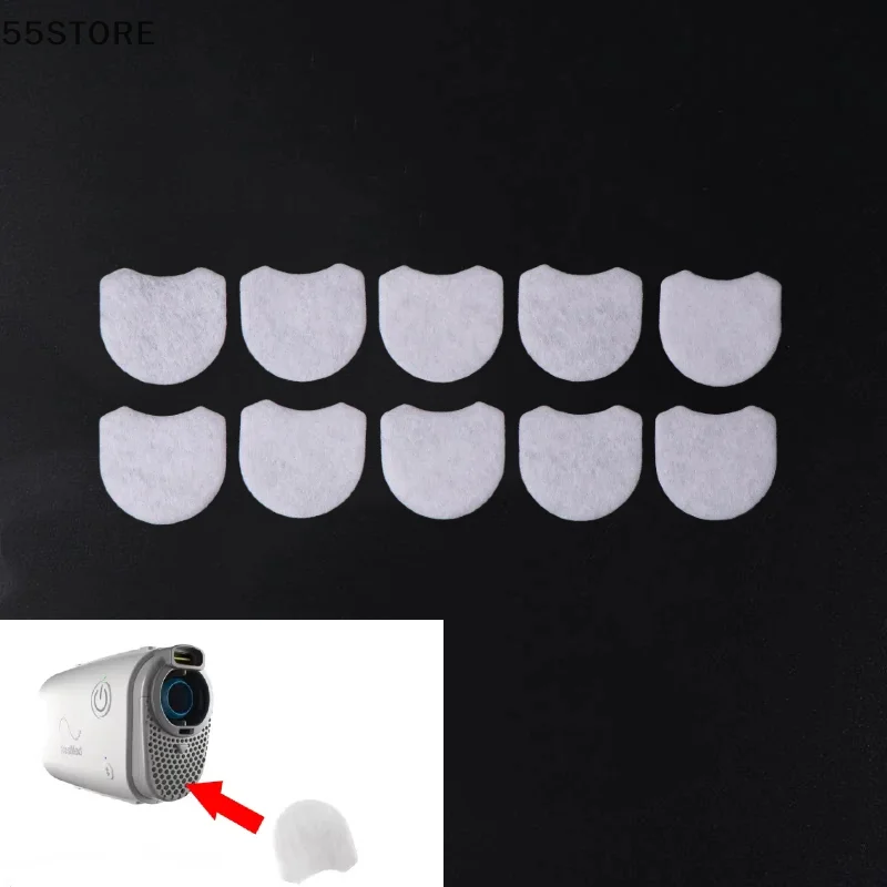 Lot de 20 pièces de masques anti-poussière empilés, filtre CPAP AirMini visible sur le dessus.
