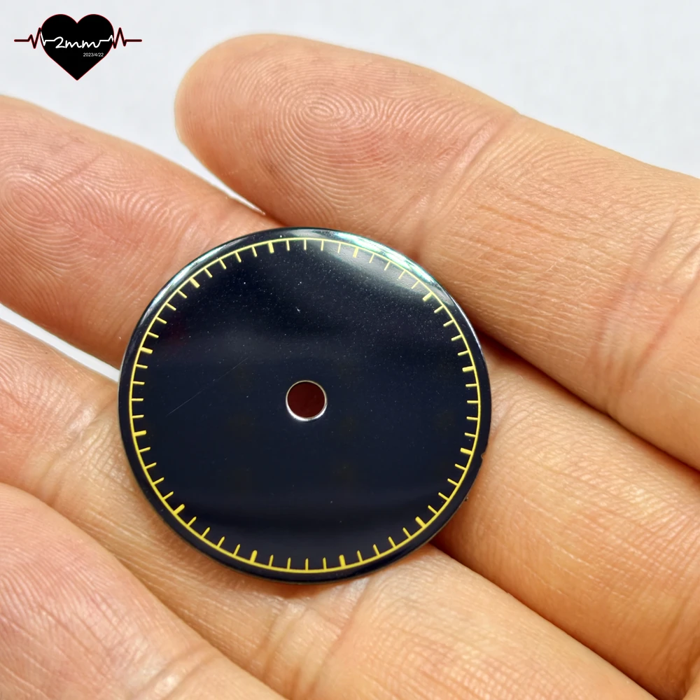 Glossy Matte Black Watch Dial with Gold Accents and Date Window