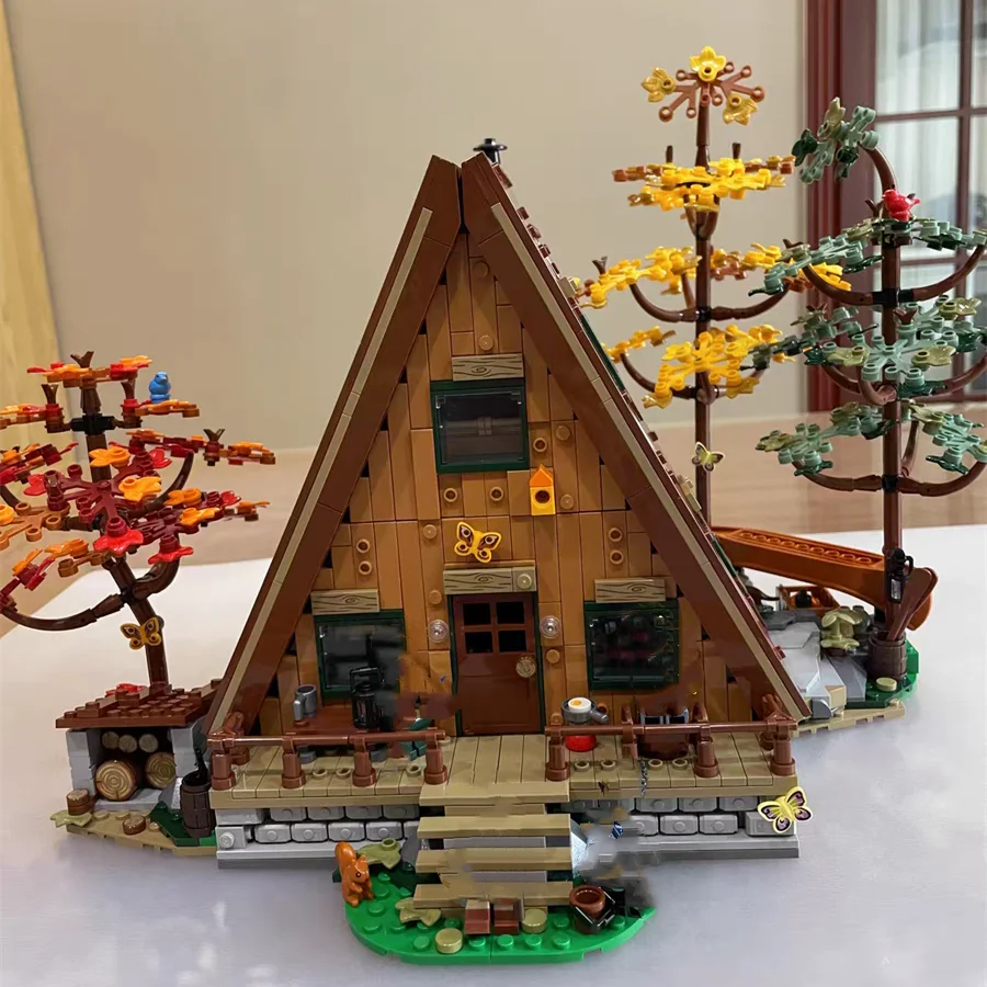Nuovo In Magazzino Camping Forest A Frame Cabin Model Creativity House Idea 2082 Pezzi Compatibile Con 21338 Building Blocks Brick Toys
