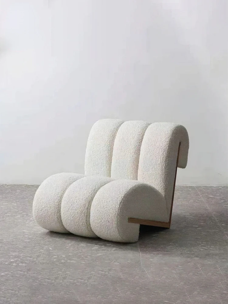 

Solid wood single lounge chair in shearling