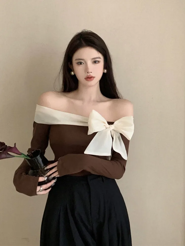 

Женская Осенняя блузка Корейская версия дизайнерская Очаровательная футболка с бантом с открытыми плечами Приталенный топ с длинным рукавом для девушек D5174