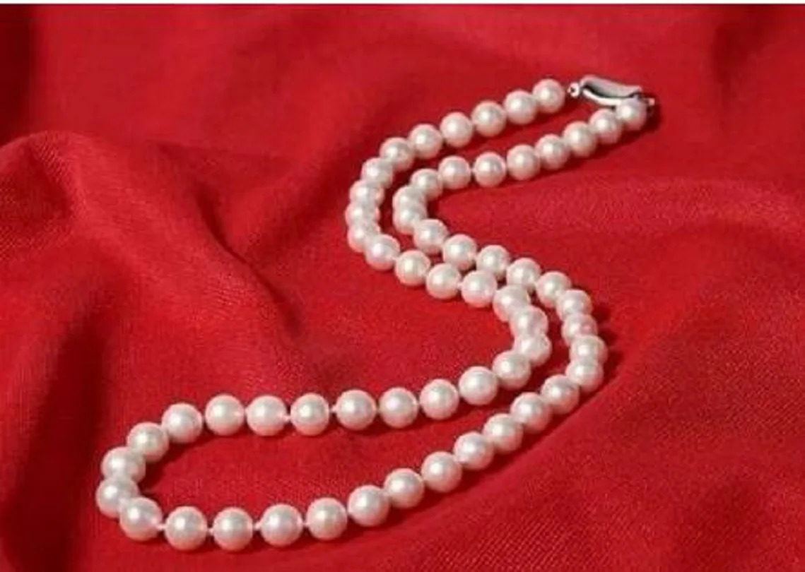

Very beautiful 9-10mm natural Nanhai round white pearl necklace 18"925 silver.