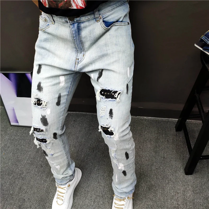 mens slim jeans Hole Blue Jean Pants Metal Rivet Patchwork Ripped Tights Jeans Men Brand European Jean Pant Men Slim Stretch Jean Denim Trousers cowboy jeans