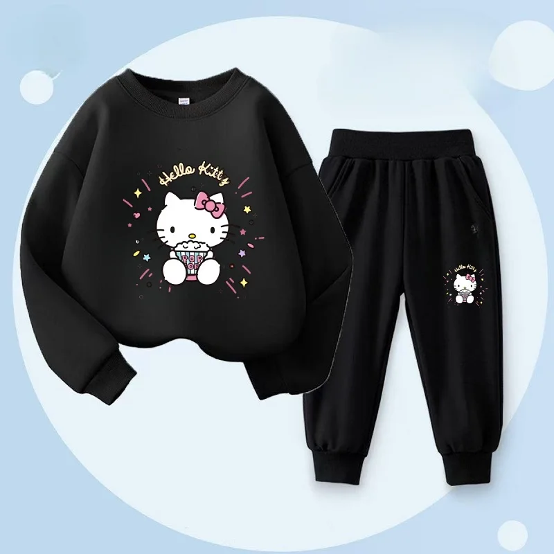 Detailed view of the autumn knit children's sweatsuit featuring a cartoon kitty design.