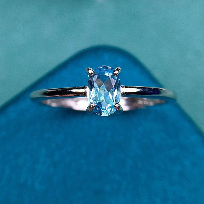 

Hotsale Natural Topaz Ring 4mm*6mm VVS Grade 0.5ct Light Blue Topaz 925 Silver Ring with 3 Layers 18K Gold Plating