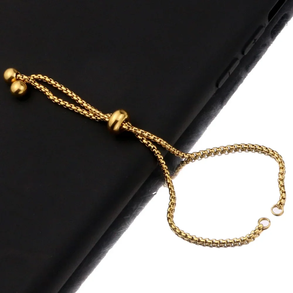Elegant Gold-Toned Stainless Steel Slide Bracelets with Rubber Bead Accents - Set of 3