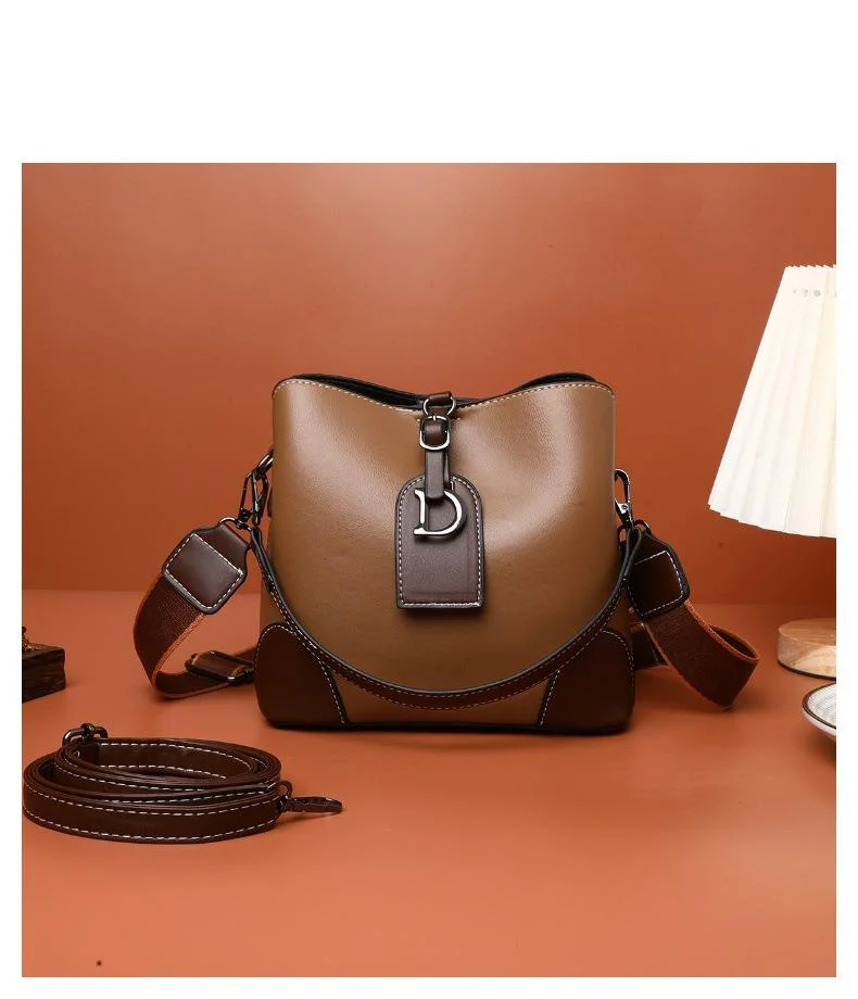 2023 Nuova borsa da donna di lusso Suni Junior Light Borsa a secchiello con texture di alta qualità Borsa a tracolla con una spalla di moda retrò_voghion.com