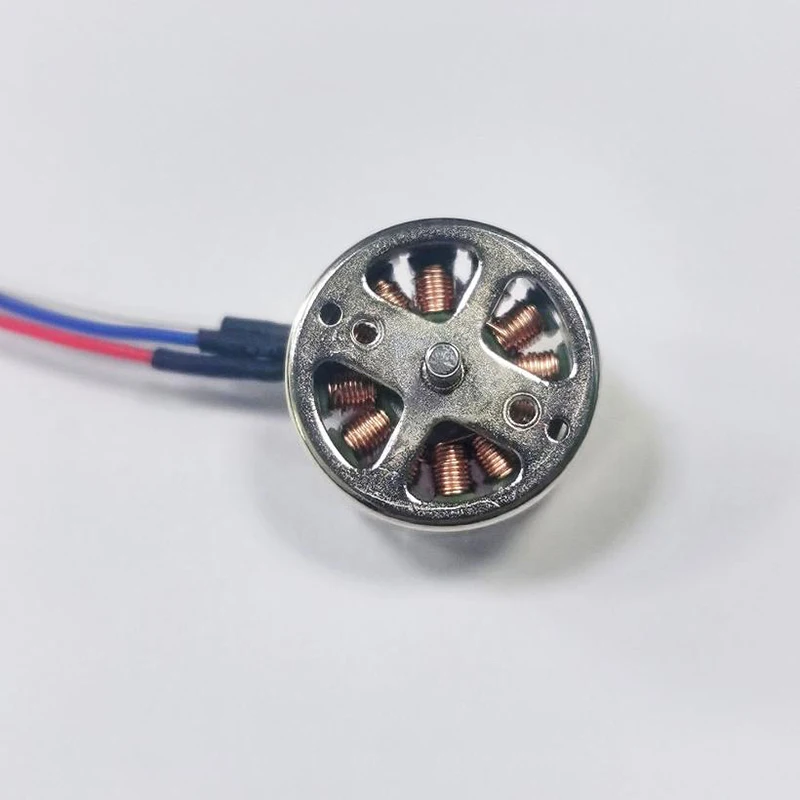 Gros plan sur le Moteur Brushless 1103 15000KV Haute Vitesse pour Micro Drone et Avion RC, détaillant les enroulements et l'aimant.