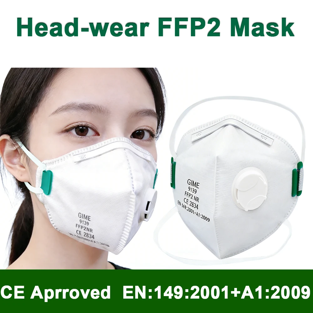 Vue rapprochée d'un masque FFP2 avec valve respiratoire, détail des couches et de l'élastique.