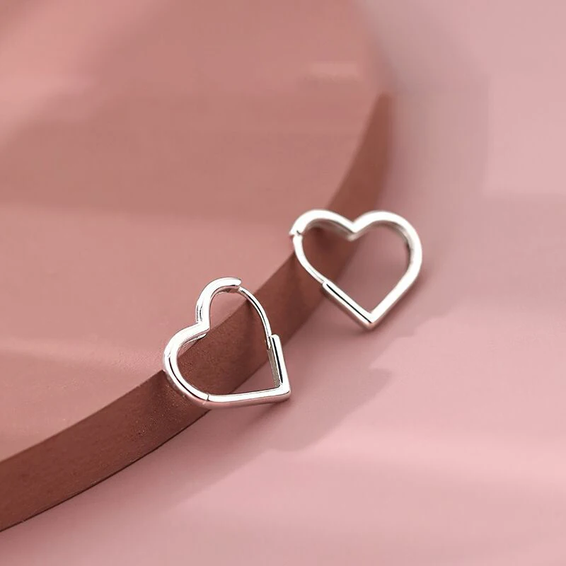 

Simple Design Silver Color Hollow Heart Drop Earrings For Women New Brand Fashion Ear Cuff Piercing Dangle Earring Gift