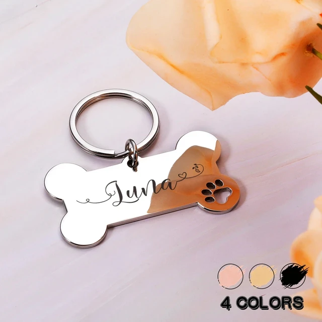 25268-6Ae04E.jpg Personalised bone pet id tag with name & contact details for medium to large dogs | |