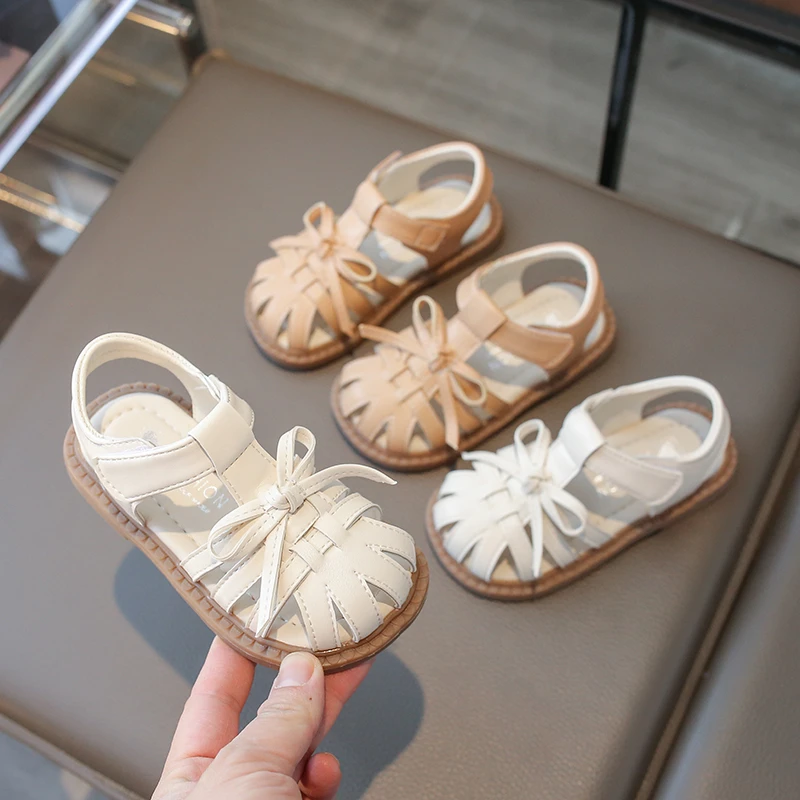 

Летние сандалии для маленьких девочек, повседневная обувь для малышей, мягкие Нескользящие Детские пляжные сандалии с вырезами и бантом, обувь принцессы