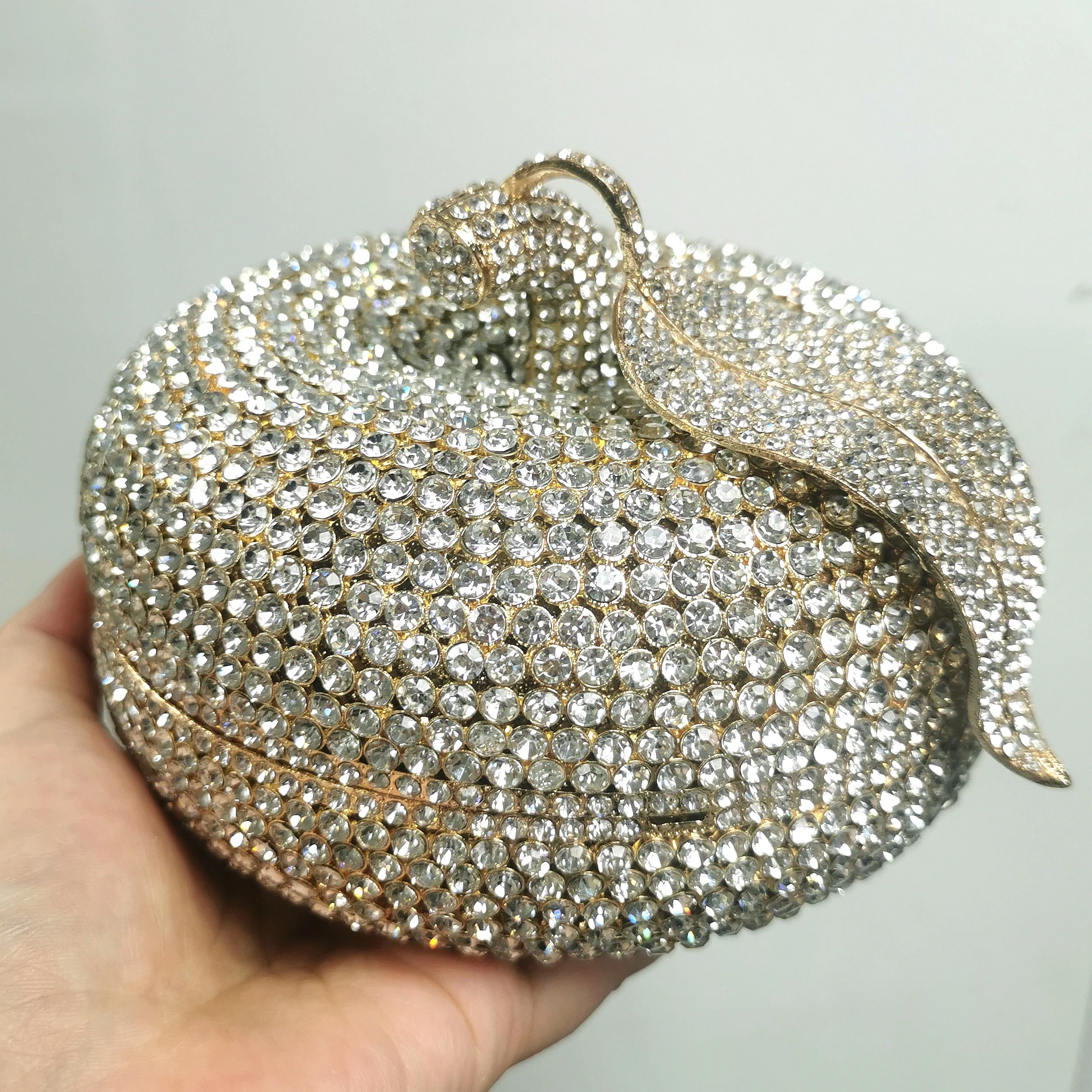 Fancy Bridal clutches and evening bags with Embroidered and Gold/Silver  designs and Rhinestones.