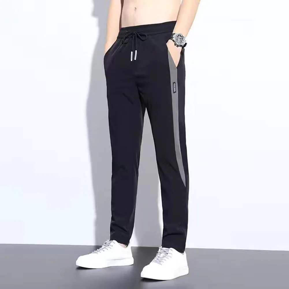 Casual Men Jogging Pants Male Slim Fit Multi-Pockets Pants 2024 New Arrival Drop-shipping