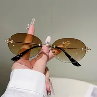 Nouveau y2k Vintage sans monture ovale lunettes de soleil femmes pour hommes marque de luxe concepteur lunettes de soleil Punk populaire boule de métal Sexy lunettes 2