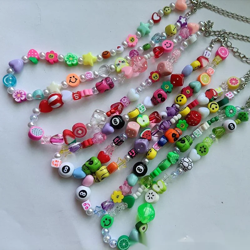 Hot Sale Halloween Skull Jewelry Soft Ceramic Smiling Face Butterfly Acrylic Dice Star Necklace_voghion.com