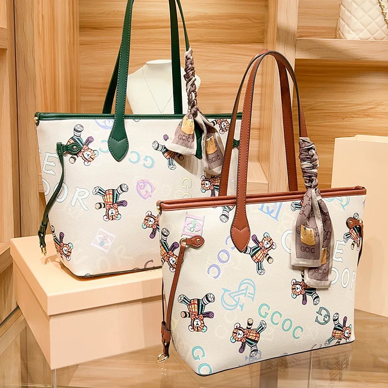 

2024 Luxury Brand Fashion Commuter Versatile Tote Bag High Quality Women's Large Capacity Small and Small One Shoulder Bag